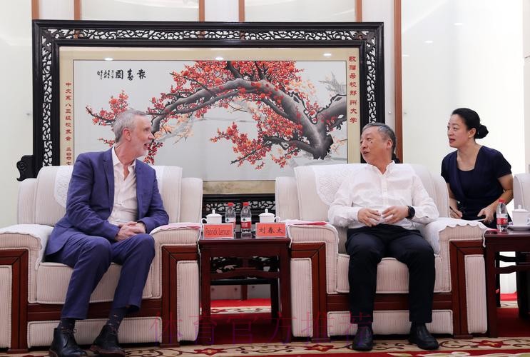 张剑会见美国国际管理集团董事长麦克·杜兰